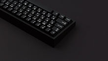 Load image into Gallery viewer, GMK CYL Hangul WoB on a black keyboard zoomed in back angled of left