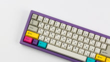 Load image into Gallery viewer, GMK CYL Beige Addon on a purple keyboard zoomed in on left