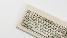 Load image into Gallery viewer, GMK CYL Beige Addon on a beige keyboard zoomed in on left