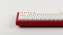 Load image into Gallery viewer, GMK CYL Dots light base on a red keyboard zoomed in on right back