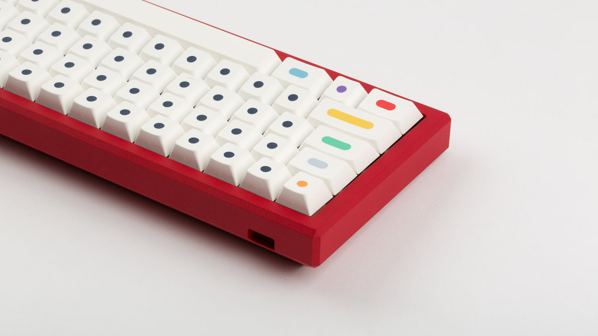  GMK CYL Dots light base on a red keyboard zoomed in on left back 