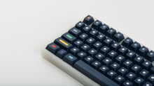 Load image into Gallery viewer, GMK CYL Dots dark base on a clear keyboard zoomed in on left