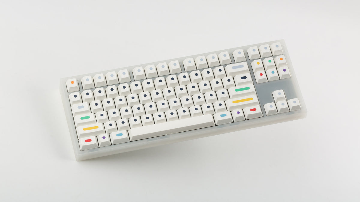  GMK CYL Dots light base on a clear keyboard angled 
