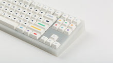 Load image into Gallery viewer, GMK CYL Dots light base on a clear keyboard zoomed in on right