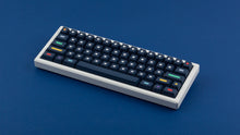 Load image into Gallery viewer, GMK CYL Dots dark base on a white keyboard angled