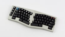 Load image into Gallery viewer, GMK CYL Gegenschlag on a beige keyboard top down angled