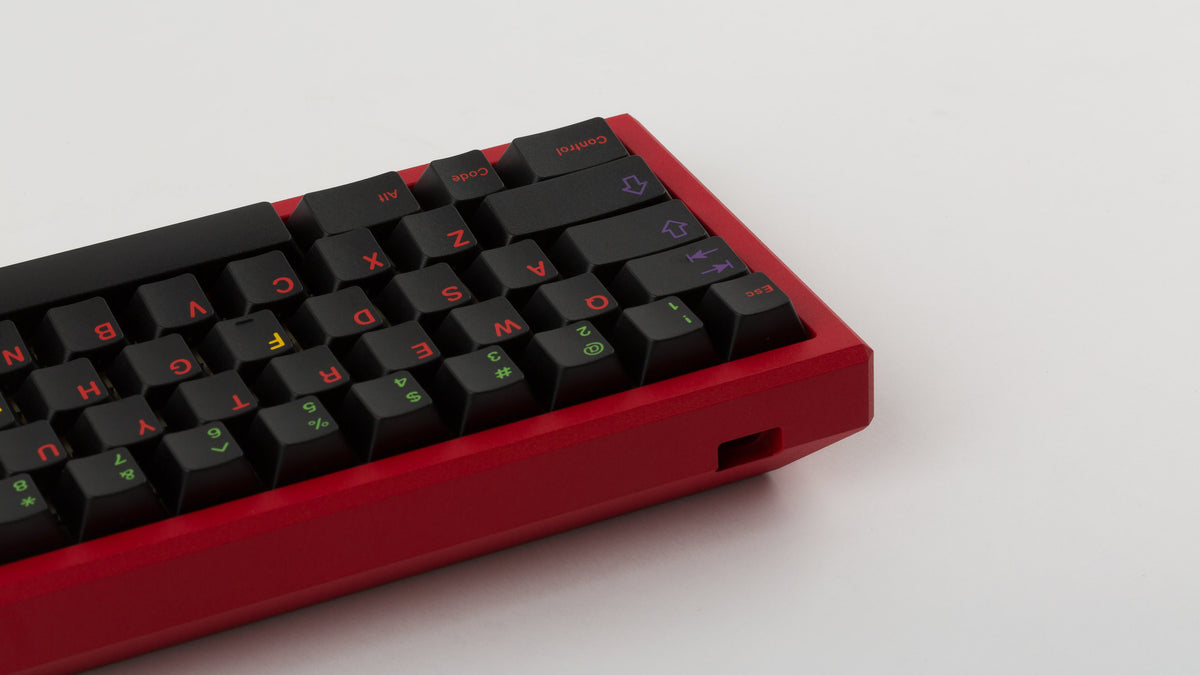  GMK CYL Nachtarbeit on a red keyboard back view left side 