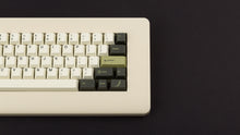 Load image into Gallery viewer, GMK CYL Olive R2 on a beige keyboard zoomed in on right