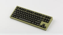 Load image into Gallery viewer, GMK CYL Olive R2 noir on a green NK87 angled
