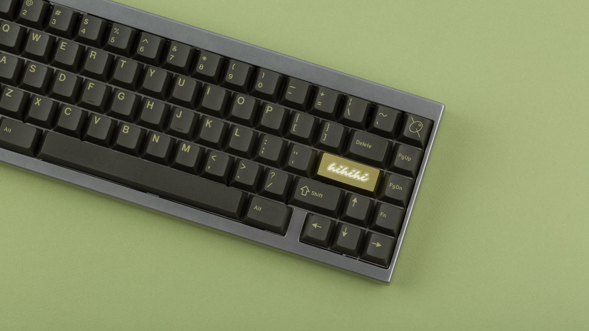  GMK CYL Olive R2 on a silver keyboard zoomed in on right at a different angle 