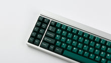 Load image into Gallery viewer, GMK CYL Taiga on a silver keyboard zoomed in on left