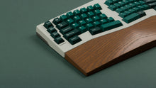 Load image into Gallery viewer, GMK CYL Taiga on a silver keyboard with wrist rest zoomed in on left