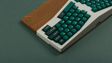 Load image into Gallery viewer, GMK CYL Taiga on a silver keyboard with wrist rest back right view