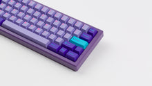Load image into Gallery viewer, GMK CYL Vaporwave on a purple keyboard zoomed in on right