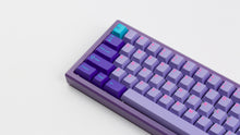 Load image into Gallery viewer, GMK CYL Vaporwave on a purple keyboard zoomed in on left