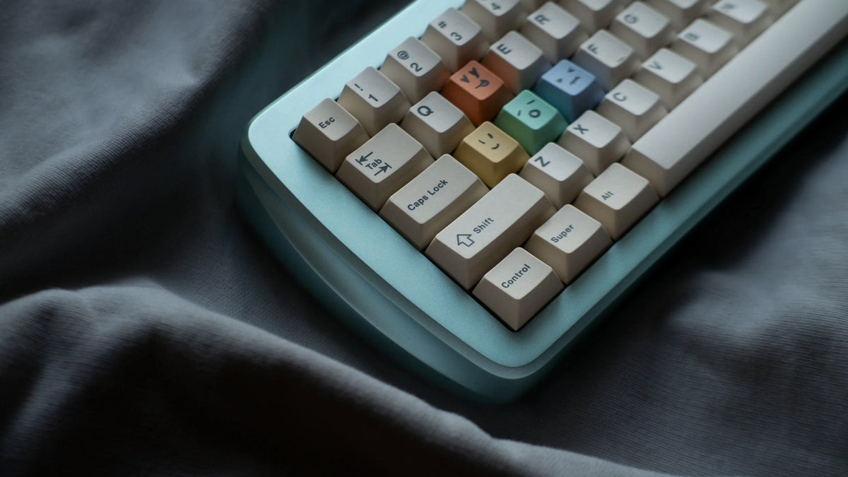 mint green case left side featuring some keycaps