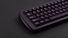 Load image into Gallery viewer, violet case with purple keycaps left side dark