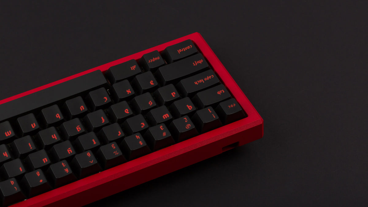  MW Heresy on a red keyboard zoomed in right 