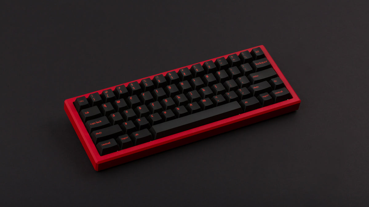  MW Heresy on a red keyboard angled 