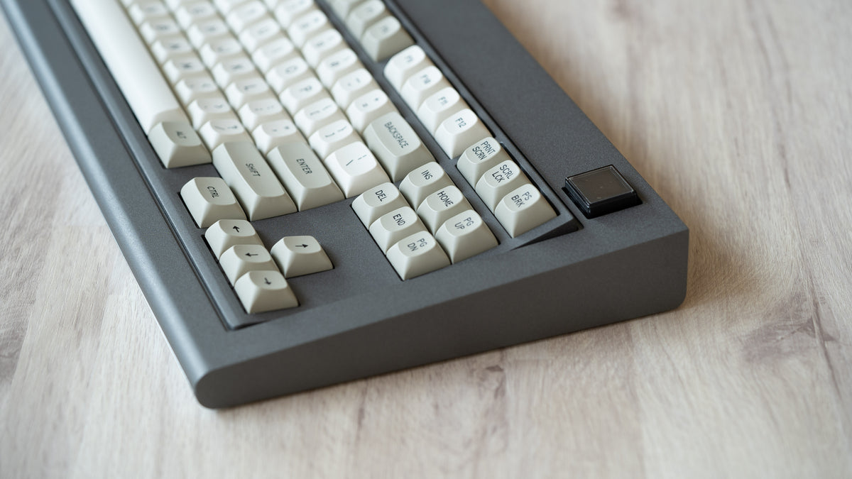  Industrial grey Model OLED zoomed in on right featuring MTNU Beige keycaps 