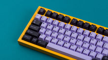 Load image into Gallery viewer, PBT Taro on a yellow NK87 zoomed in left