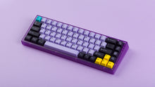 Load image into Gallery viewer, PBT Taro on a purple keyboard angled