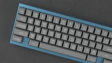 Load image into Gallery viewer, render of SA ASCII on a blue SeisCero keyboard zoomed in on left