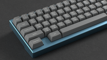 Load image into Gallery viewer, render of SA ASCII on a blue SeisCero keyboard angled zoom in on left