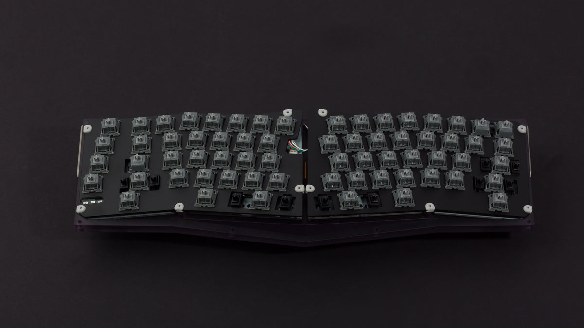 Anodized black Type-K with plate featuring dark gray switches
