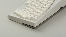 Load image into Gallery viewer, Powder coat beige Type-K zoomed in on right back with sandblasted stainless steel weight featuring black on beige keycaps
