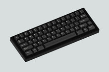 Load image into Gallery viewer, render of soul black case angled featuring white on black keycaps