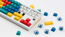 Load image into Gallery viewer, White XOX 70 FRL TKL with yellow bottom featuring handarbeit keycaps angled 