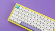 Load image into Gallery viewer, DSS Easter on a yellow keyboard zoomed in left