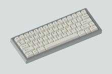 Load image into Gallery viewer, render of lightning silver case angled featuring some white keycaps