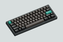 Load image into Gallery viewer, business grey case angled featuring some keycaps