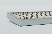Load image into Gallery viewer, render of the front left of a lightning silver case featuring some switches