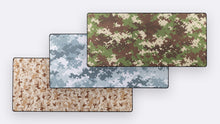 Load image into Gallery viewer, Photo of the Camo Deskpad designs layered together on a white background