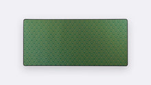 Load image into Gallery viewer, Art Movement Deskpad in Art Deco with a deep green and gold repeating fan pattern on a white background