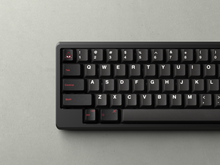 Load image into Gallery viewer, render of GMK CYL Evil Dolch on a black keyboard close up of left side