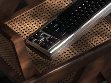 Load image into Gallery viewer, NoryTek70 back view angled on chair