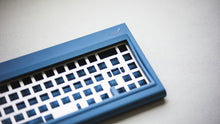 Load image into Gallery viewer, curve 65 keyboard in blue close up on right side angled