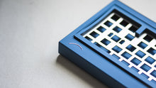 Load image into Gallery viewer, curve 65 keyboard in blue close up on right side angled back view