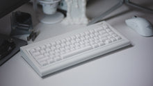 Load image into Gallery viewer, curve 65 keyboard in white on desk angled