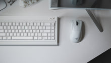 Load image into Gallery viewer, curve 65 keyboard in white on desk close up on right side