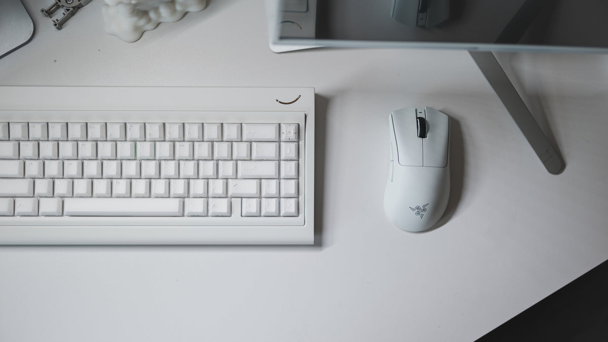  curve 65 keyboard in white on desk close up on right side 