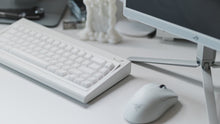 Load image into Gallery viewer, curve 65 keyboard in white on desk right side angled