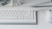 Load image into Gallery viewer, curve 65 keyboard in white on desk front view close up