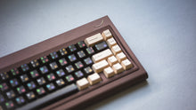 Load image into Gallery viewer, curve 65 keyboard in brown close up on right side angled