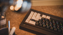 Load image into Gallery viewer, curve 65 keyboard in brown on cork