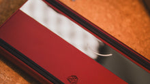 Load image into Gallery viewer, curve 65 keyboard in red on cork bottom angled close up on left side